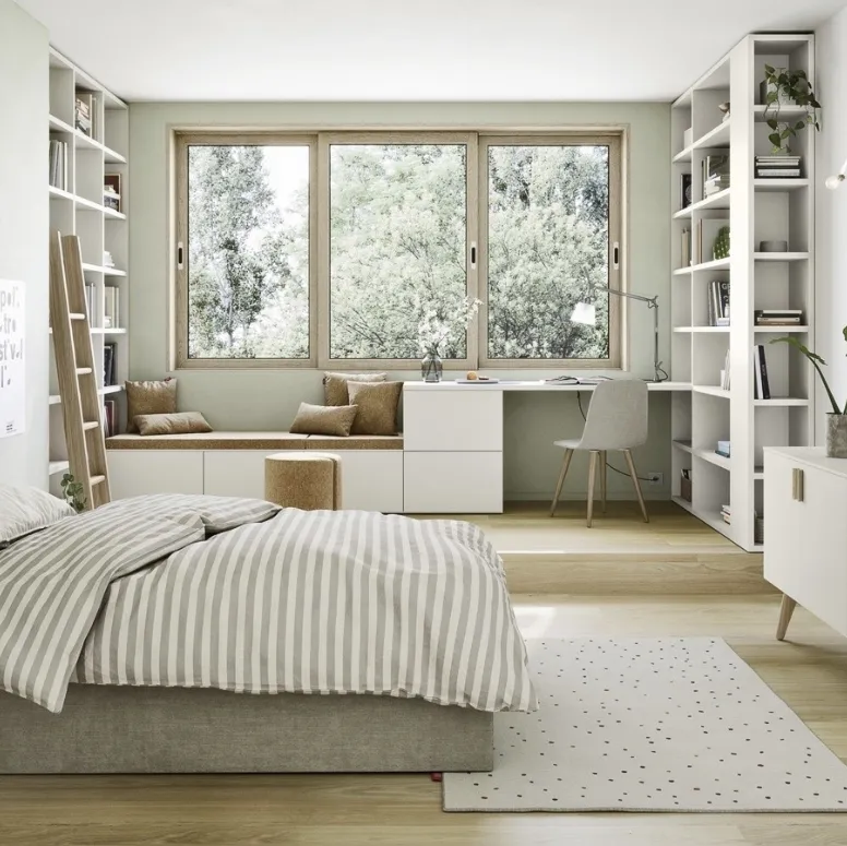 Cameretta componibile con scrivania e 2 librerie a muro Next space 01 di Nidi